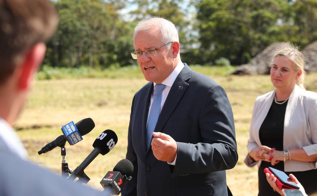Scott Morrison talking to the media at Tomago on Thursday. Picture: Max Mason-Hubers