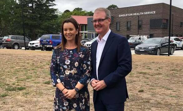 TARGET: Labor candidate Melanie Dagg with opposition leader Michael Daley in Singleton last week.