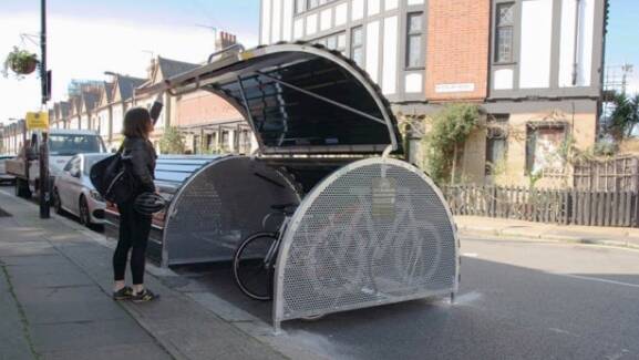 LOCK-UP: A photograph of on-street bicycle storage bays included in the council motion on Tuesday night.