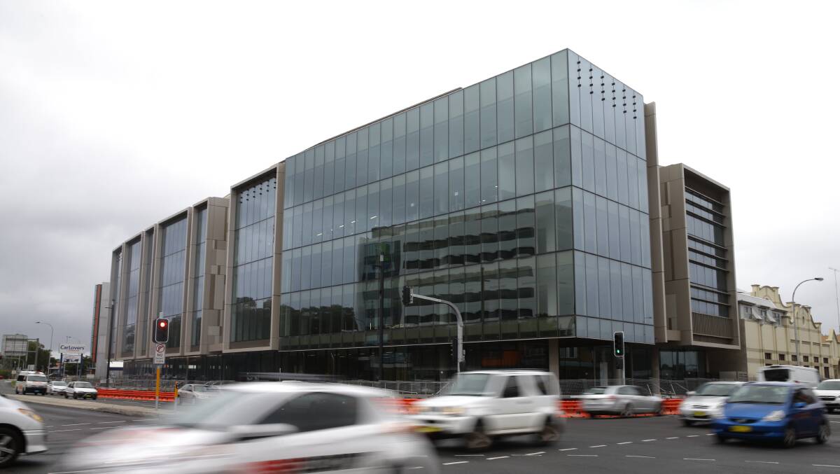 TURNING UP THE HEAT: City of Newcastle's new home in Stewart Avenue, Newcastle West. Most council staff are due to move in to the building on October 8. 