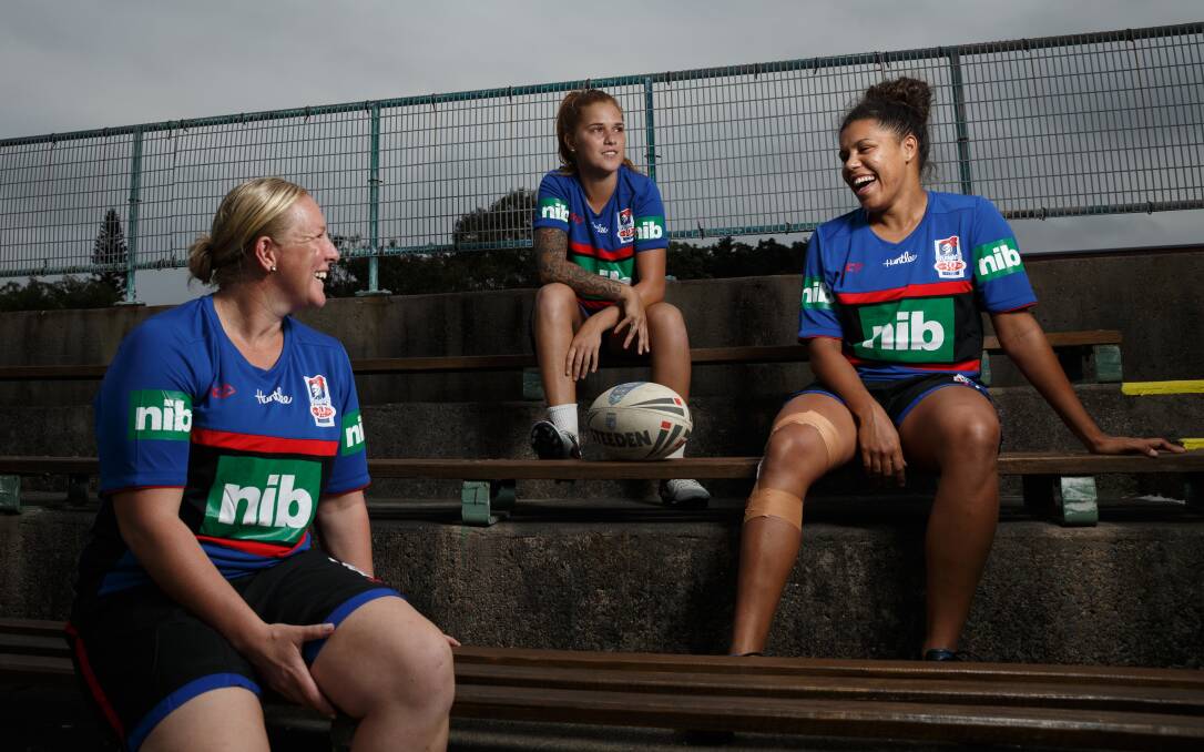 KICK-OFF: Bec Young, Caitlin Morgan and Simone Smith before a Knights exhibition game against Cronulla in 2017.
