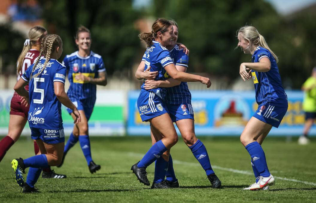 CELEBRATING: Olympic's women's side after scoring a goal at Darling Street Oval in March. The club's new amenities will include a women's change room. 