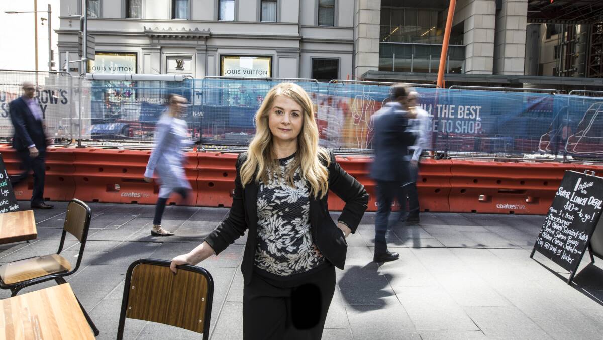 NOT HAPPY: Angela Vithoulkas, outside her cafe in George Street, wants to lead a class action on behalf of Newcastle traders. Picture: Jessica Hromas