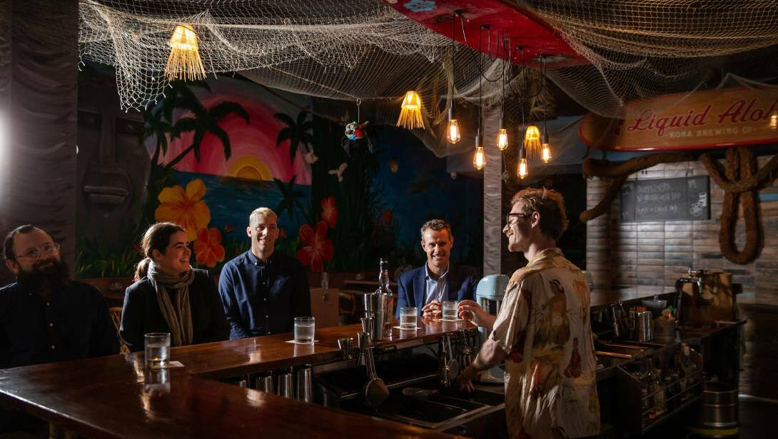 LATE CALL: Bar owners Chris Wilson, Prudence Farquhar and Ethan Ortlipp with MP Tim Crakanthorp last month backing a trial of relaxed liquor laws. Picture: Marina Neil