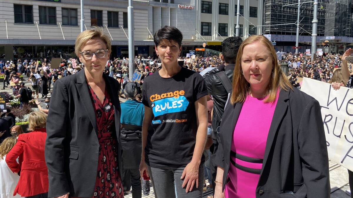 RALLYING: Kate Washington, centre, with Charlestown MP Jodie Harrison, left, and Maitland MP Jenny Aitchison at Monday's Women's March 4 Justice in Sydney.