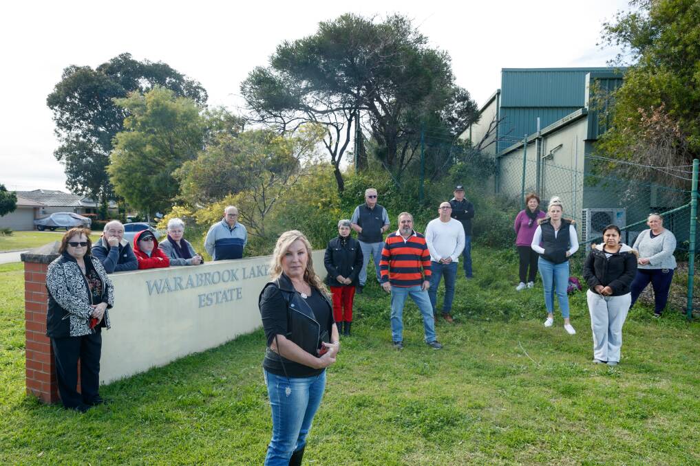 OPPOSITION: Leanne Lowe and fellow neighbours outside the site of the proposed pet crematorium at Warabrook. Picture: Max Mason-Hubers