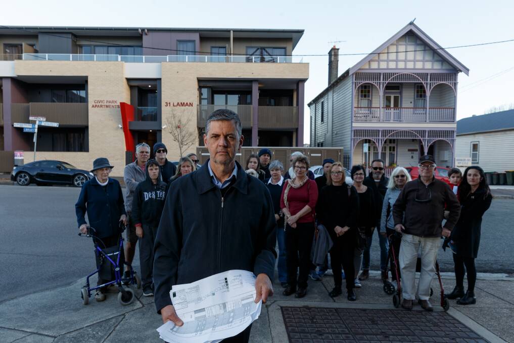 Residents opposed to the Laman Street development gather outside the building in August. Picture: Max Mason-Hubers