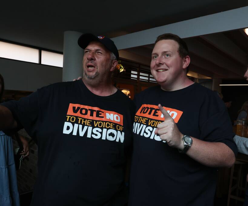 Newcastle and Hunter for No campaign manager and Liberal party member Blake Keating, right, celebrates at a Newcastle pub on Saturday night with former One Nation candidate Pietro Di Girolamo. Picture by Marina Neil