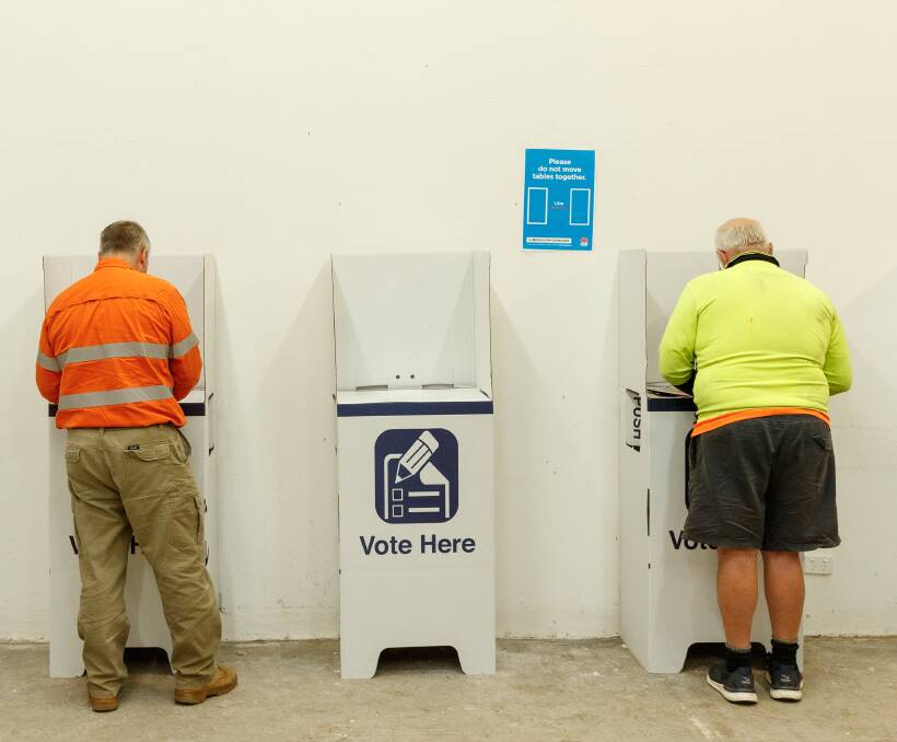 GETTING IN EARLY: Voters at a pre-polling booth in Muswellbrook. More than 10,000 voters have already cast their ballots. Picture: Max Mason-Hubers