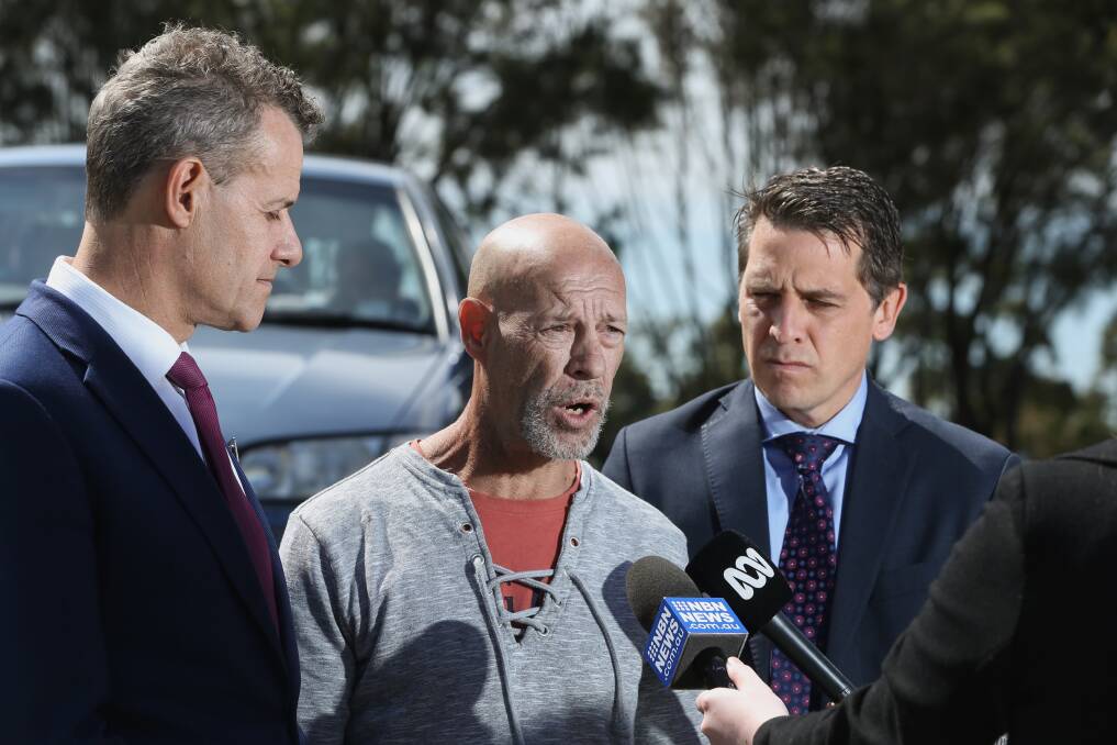 Troy Hurst talking to the media in Carrington on Thursday with Tim Crakanthorp and Ryan Park. Picture: Marina Neil