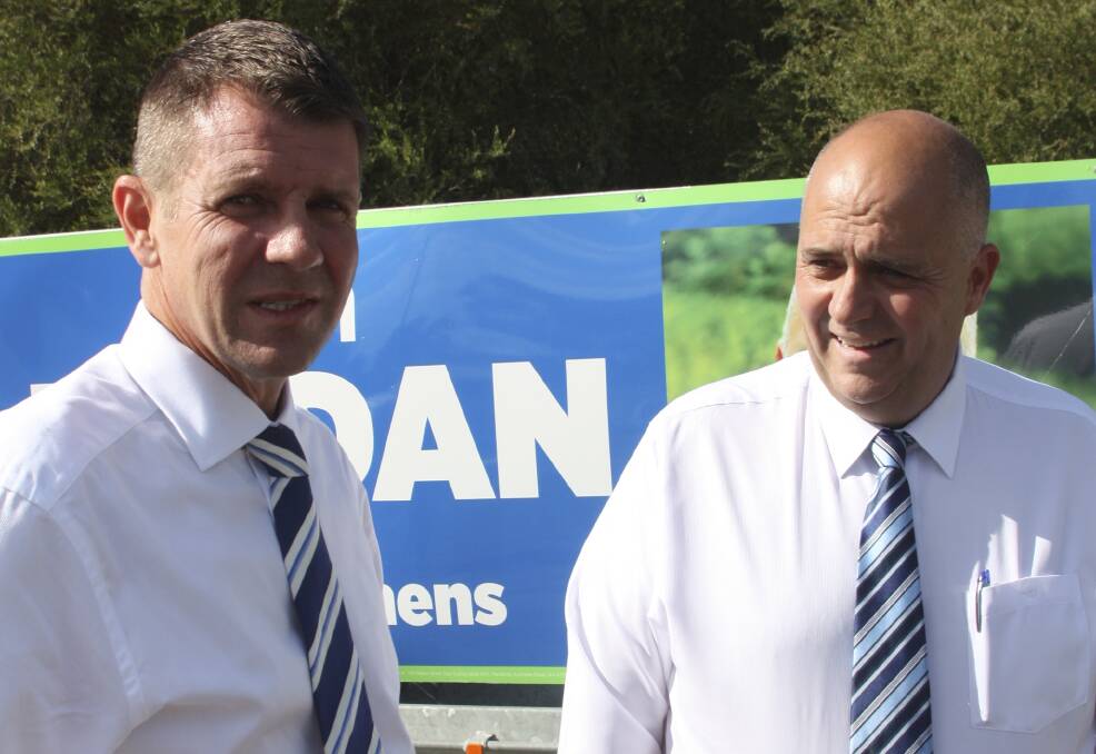Mike Baird and former Port Stephens Liberal candidate Ken Jordan in Williamtown in March 2015 to announce $70 million funding for Nelson Bay Road.