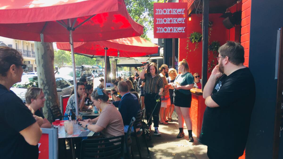 BUSY: The cafe crowd in Darby Street on Sunday. The coronavirus outbreak appears to have had little effect yet on social interaction in Newcastle.