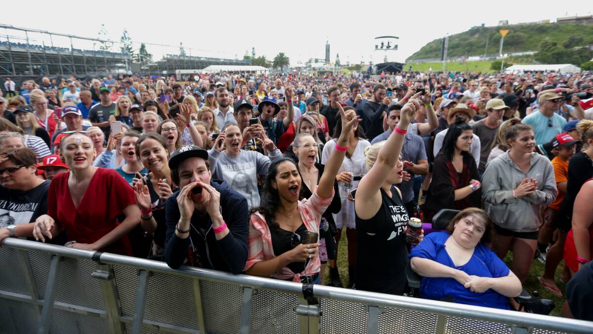 The crowd cheers on The Veronicas in Foreshore Park. Picture: Jonathan Carroll