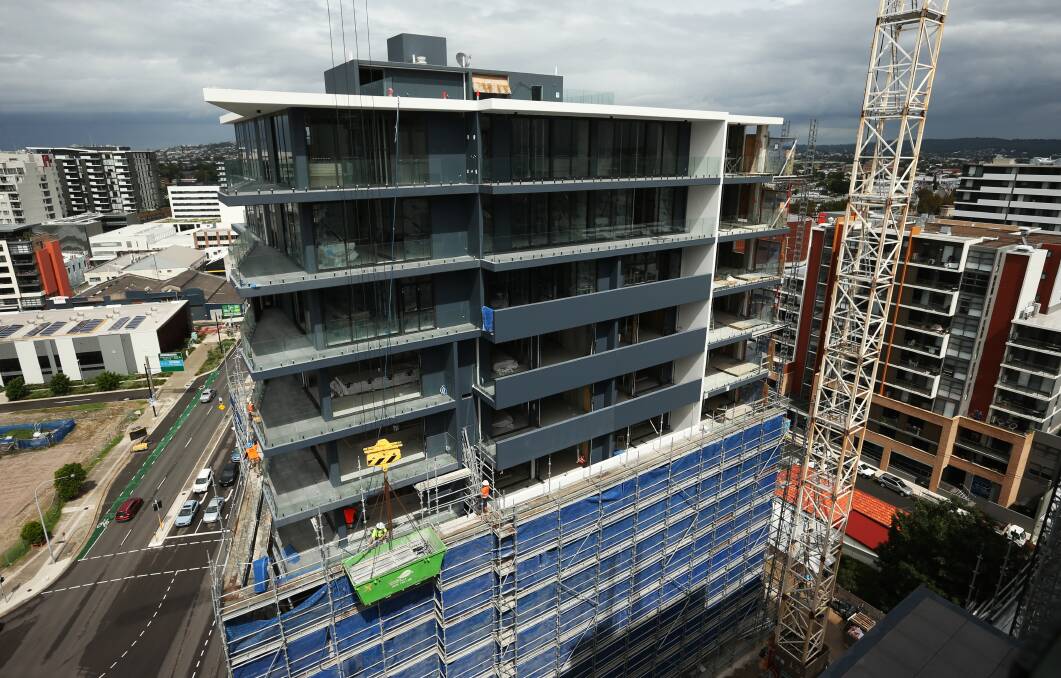 GOING DOWN: Apartment and townhouse approvals halved in Newcastle last financial year. Picture: Simone De Peak 