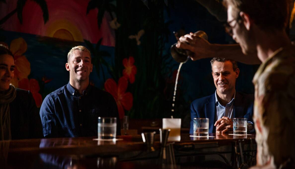 DRINK DEBATE: Newcastle MP Tim Crakanthorp, right, at a media event last week to promote relaxing the city's late-night trading restrictions. Picture: Marina Neil