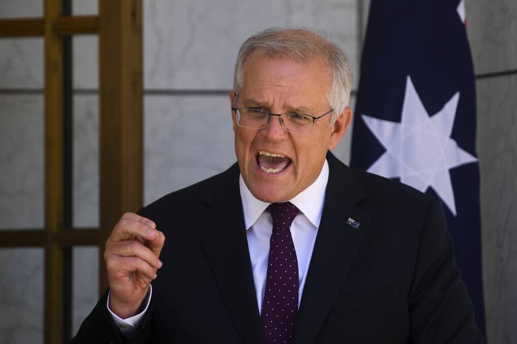 'GEAR CHANGE': Scott Morrison talking to the media in Canberra after Thursday's national cabinet meeting.