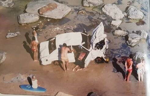 FLASHBACK: The scene of a 1979 crash involving a vehicle plunging over the cliff and landing on the sand at Bar Beach.