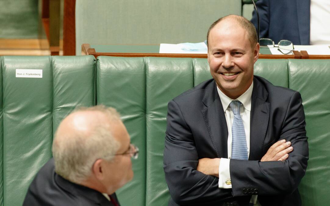 Treasurer Josh Frydenberg says business is picking up as government support "tapers". Picture: Sitthixay Ditthavong