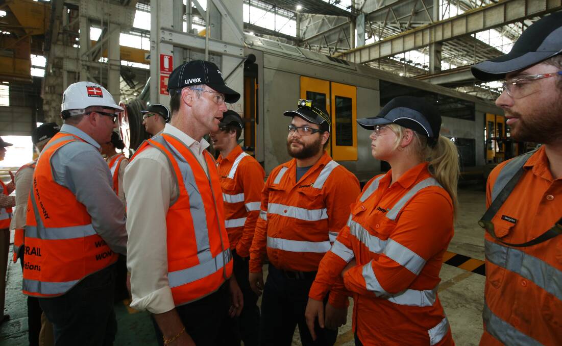 Chris Minns meets workers at Downer's Cardiff workshop on Monday. Picture by Simone De Peak