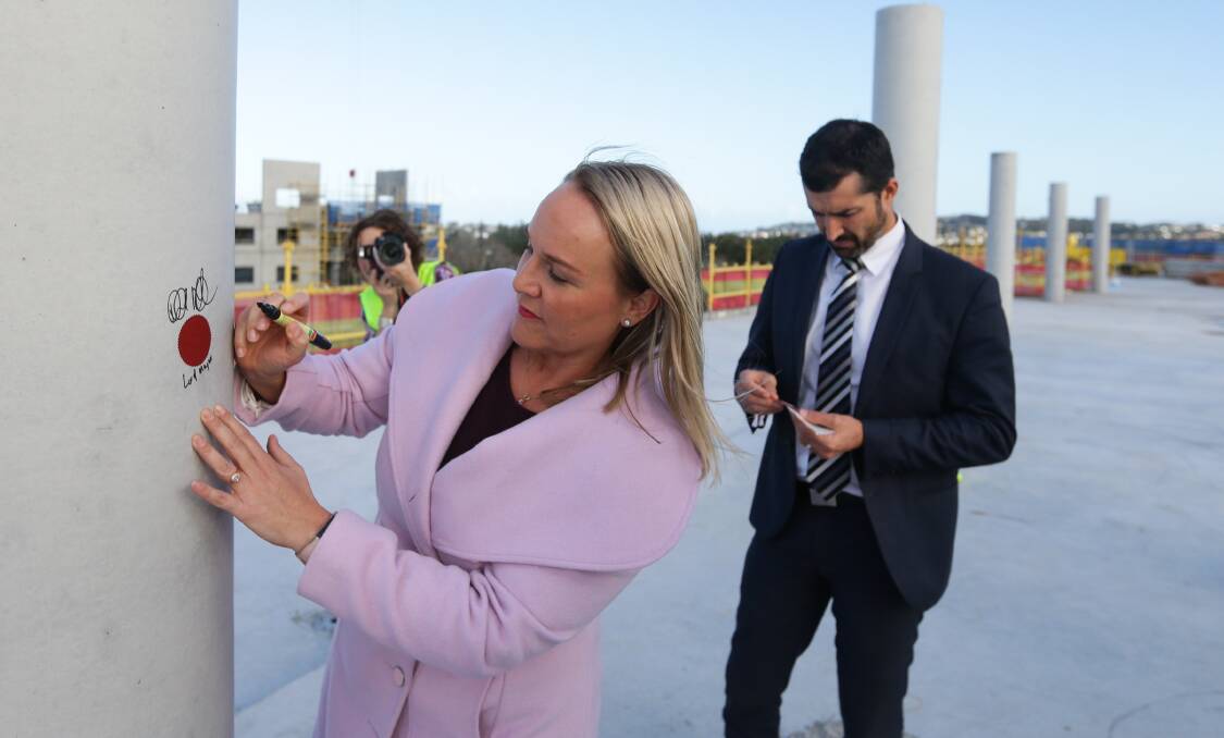 Lord mayor Nuatali Nelmes and CEO Jeremy Bath at the "topping out" ceremony for the new Stewart Avenue building in 2018. Picture: Jonathan Carroll