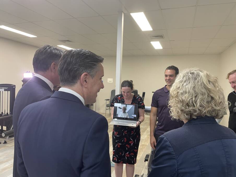 Boost: Deputy Labor leader Richard Marles, shadow health minister Mark Butler, and Sharon Claydon announce $1 million in support for the Kaden Centre, as the centre founder Sue Clark-Pitrolo tunes in from Germany.