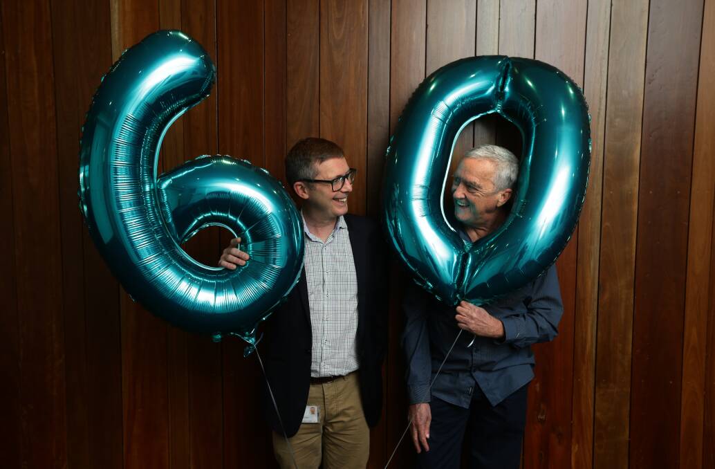 Big birthday: Conjoint Professor Peter Wark with James Brooks, one of the few people with CF to live to the age of 60. Picture: Jonathan Carroll