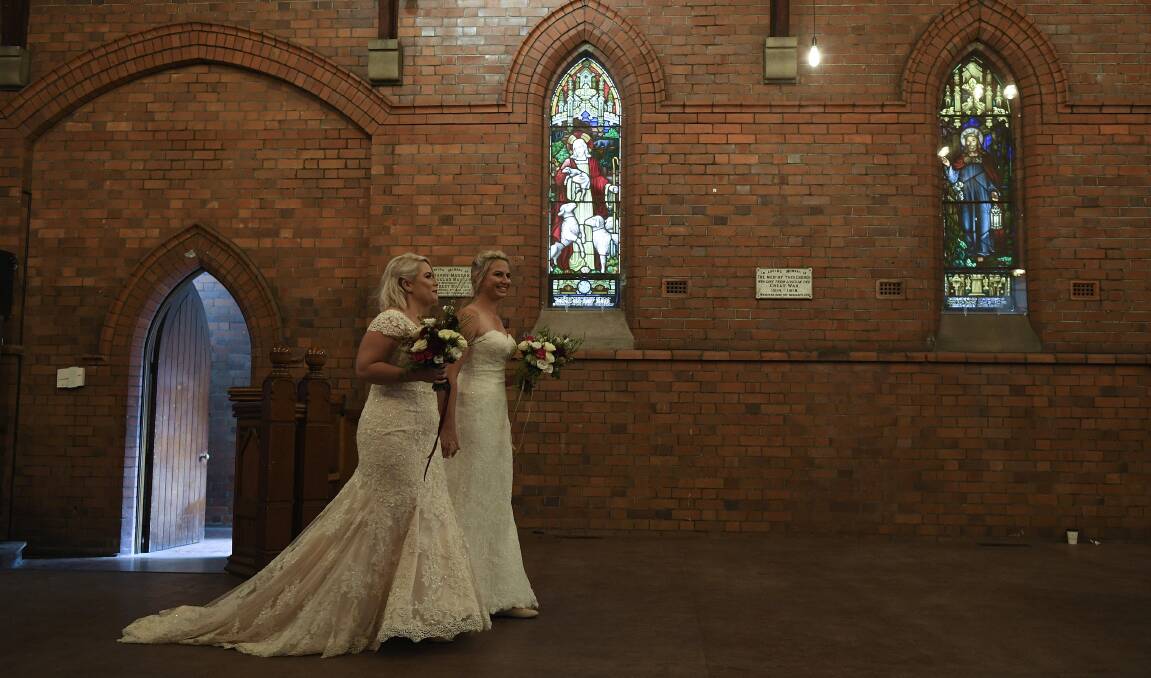 Wife and wife: Sarah Turnbull and Rebecca Hickson walked down the aisle together. 