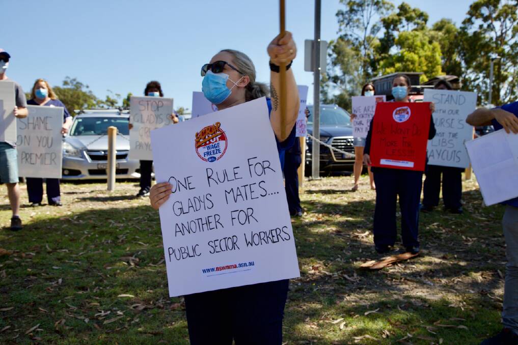 Nurses and midwives rallied outside Belmont Hospital on Wednesday to protest the 0.3 per cent pay offer by the NSW Government instead of the scheduled 2.5 per cent increase.