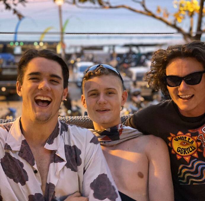 On holiday: Lawson in Bali with his friends, Jacob Doran and Frazer McDonald.