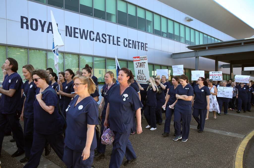 Protest: Nurses marched over staffing conditions at John Hunter Hospital in September. They have not seen any improvement since, despite Hunter New England Health saying it has recruited 52 positions. Picture: Marina Neil. 