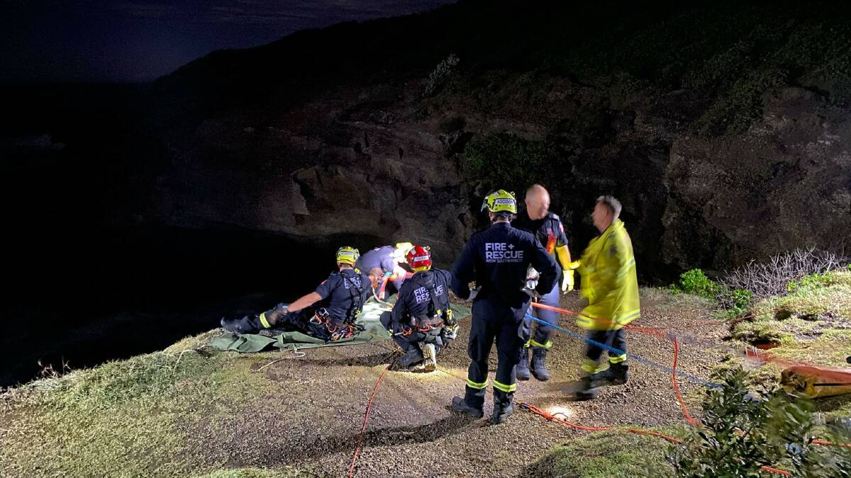 LUCKY: Shanaye Hunter and Jack Teerman were rescued from an ocean cave after they became trapped in rising, choppy waters. Picture: Fire and Rescue NSW Station Lambton