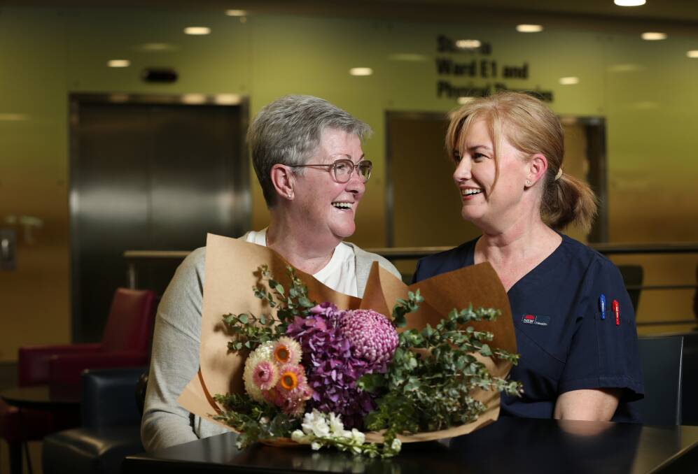 Strong bond: Elizabeth Stringer, left, was reunited with the John Hunter Hospital trauma nurse Kate King who was the first on the scene of her car accident last year. They have formed a special bond since. Picture: Simone De Peak