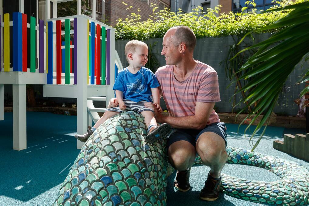 A sweet escape: Jimmy, 2, and his dad, David Ryan. Picture: Max Mason-Hubers