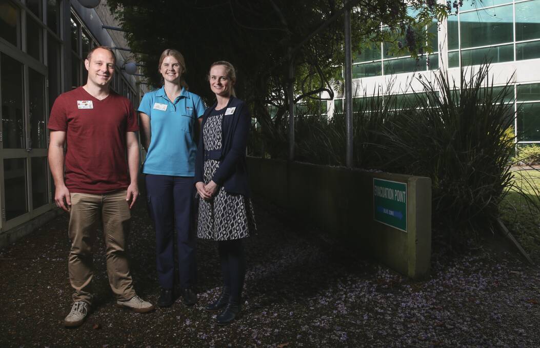 Helping hands: Jared Allen, clinical nurse consultant, Anna Brownhill, physiotherapist and peadiatrician Dr Elizabeth Percival work within the John Hunter Children's Hospital's Weight Management Service. Picture: Marina Neil