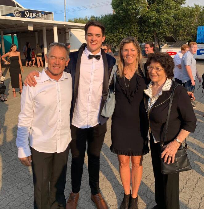 Lawson with his parents, Phillip and Therese, and his nan, Marie Rankin, at his Year 12 formal.