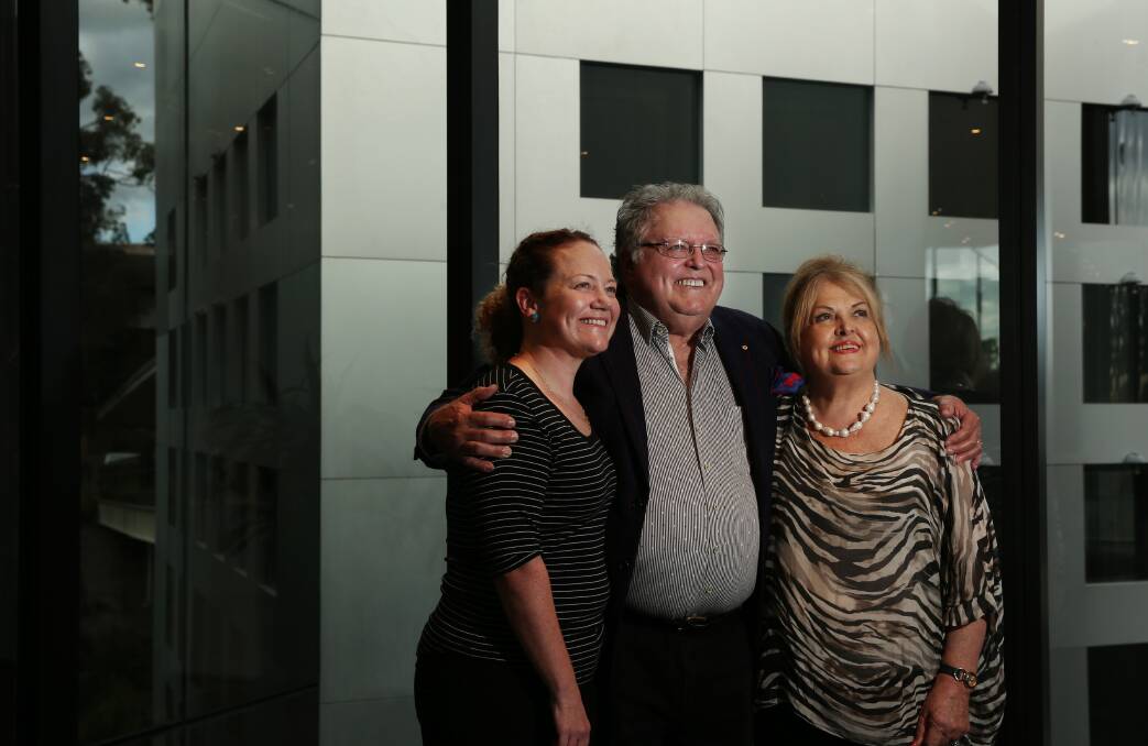 Support: Dr Nikola Bowden, left, with Brian and Fay McGuigan, who are backing a 10-year HMRI research fellowship. Picture: Simone De Peak.