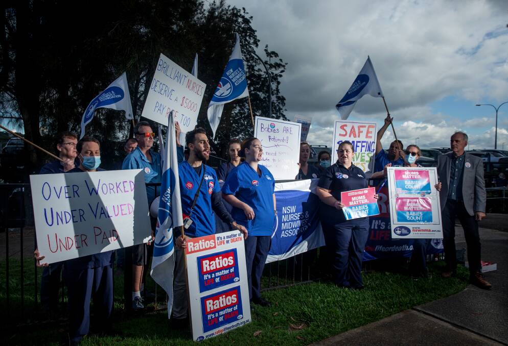 Rally: Members of the NSW Nurses and Midwives Association outside John Hunter Hospital on Thursday explained why they must keep fighting for safer staffing ratios. Picture: Marina Neil