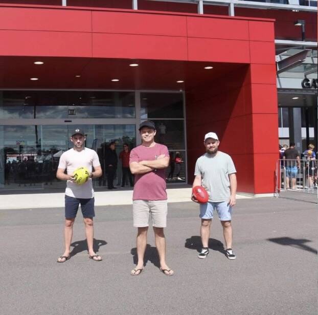 From left: What started as a 150km trek with Ethan Coker, Nathan Hill, and Luke Alexander has turned into a crew of 30-plus walking from Sydney to McDonald Jones Stadium.