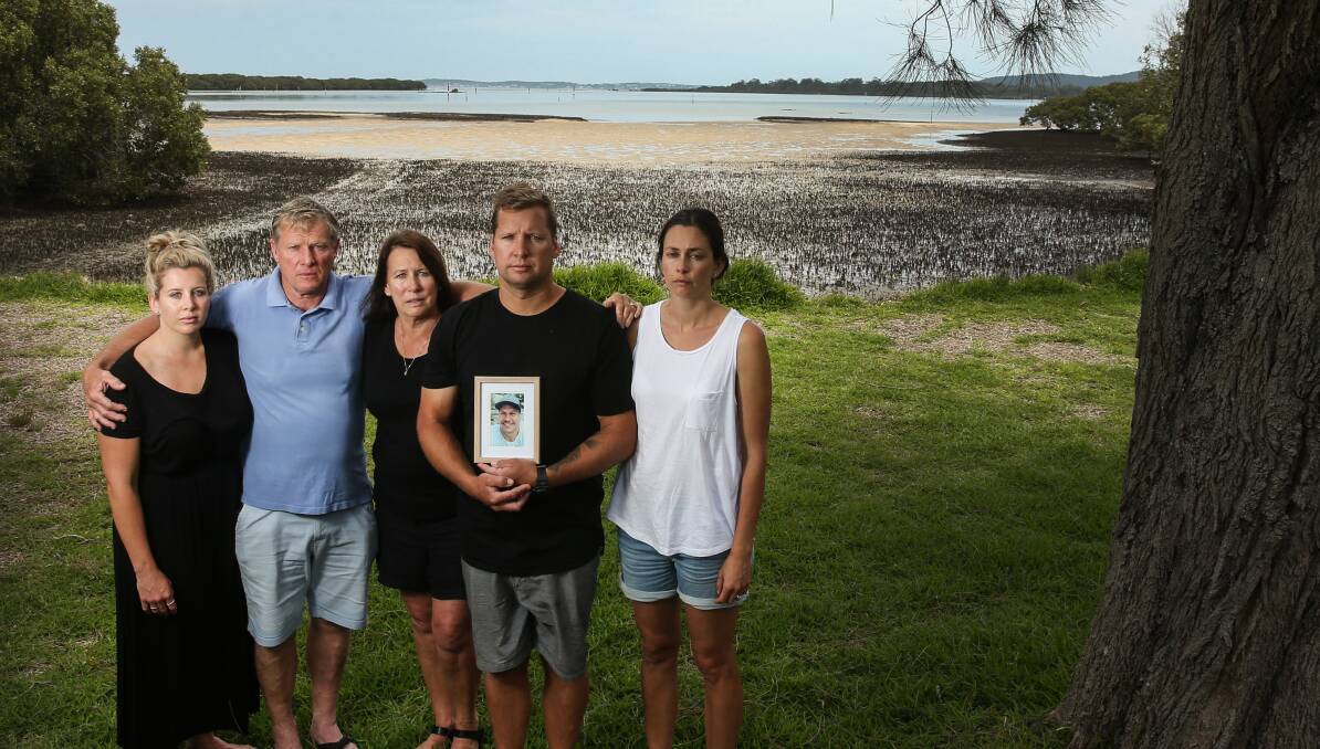 SHATTERED: Tom Davy's devastated family at their Tea Gardens home - sister Katie, father Neil, mother Heather, brother Joshua and sister-in-law Danielle. Picture: Marina Neil