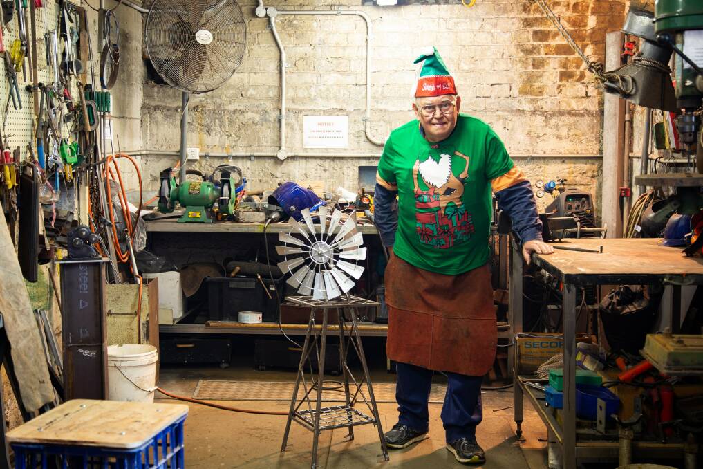 'Tis the season: Hundreds of Mens Shed "elves" like Glenn Roddenby have been crafting stockpiles of traditional toys for Christmas.