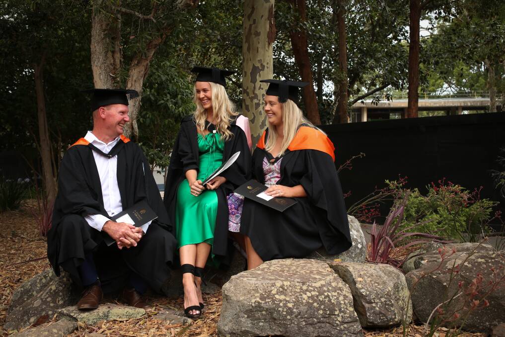 Family ties: Adrian Brunette with his daughters from left Kimberley and Karlee Brunette, all graduated at University of Newcastle. Adrian & Karlee graduated with a bachelor of Nursing and Kimberley graduated with a bachelor of physiotherapy with honours. Picture: Simone De Peak