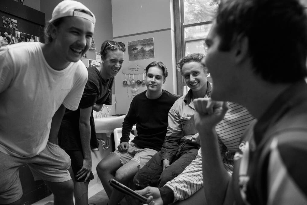 Road to recovery: Lawson Rankin shares a laugh with visiting friends Will Trow, Luke Godfrey-Smith, Blake Quinn, Tarj Lyle and (obscured) Jay Bailey. At his room in the Rankin Centre, John Hunter Hospital. Picture: Max Mason-Hubers