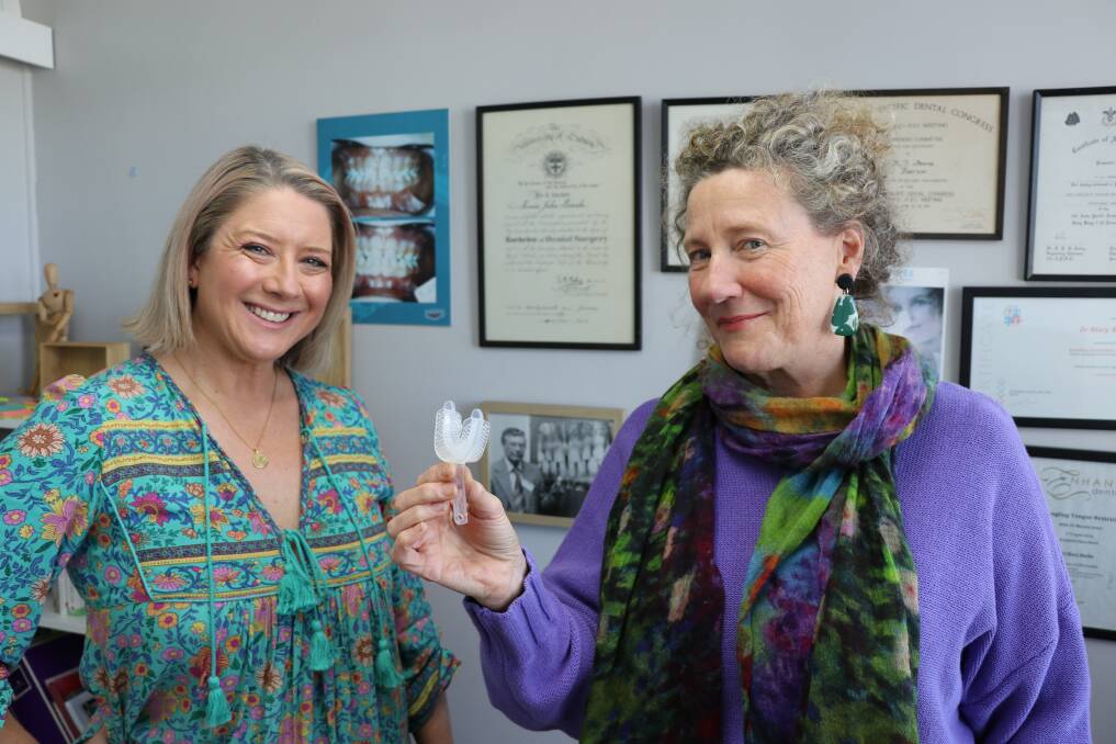 Teaming up: Speech pathologist and Phd candidate Hollie-Ann Shortland, left, with Myo Munchee Australia's chief Mary Bourke and the device.