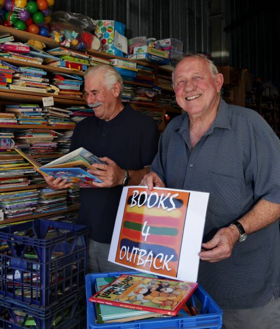 Good books: Ross Lane, pictured right, and Bill Iceton are co-founders of Books 4 Outback, which delivers pre-loved books to regional schools. Picture: Simone De Peak.