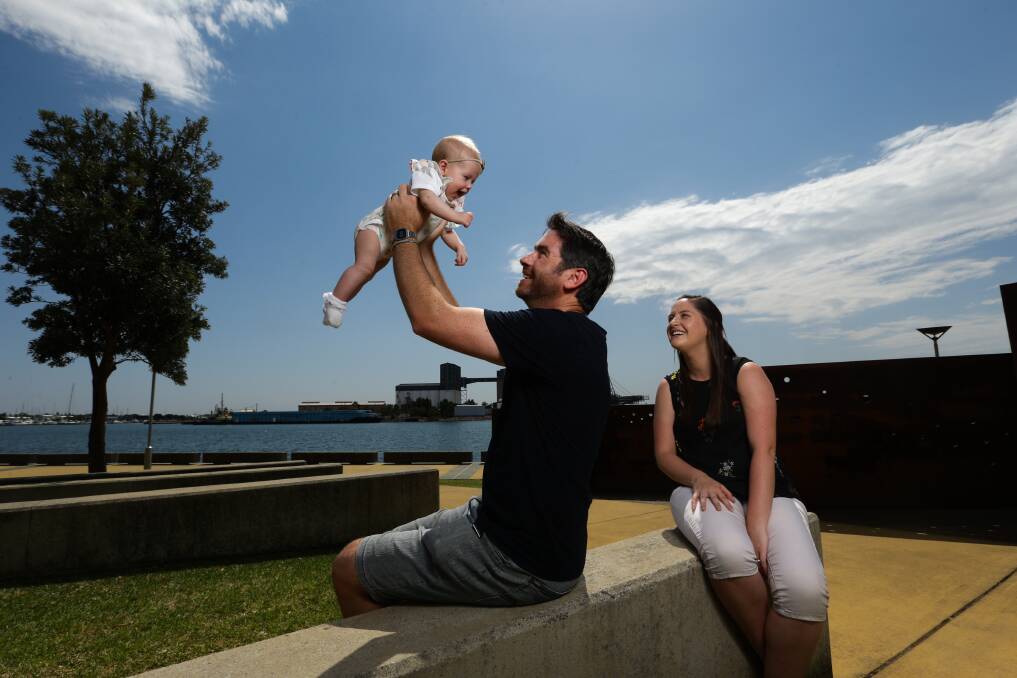 Blood bond: Plasma donor Daniel Alexander, with his sister Kate Stendell and baby niece, Flora, aged four months. Picture: Jonathan Carroll.