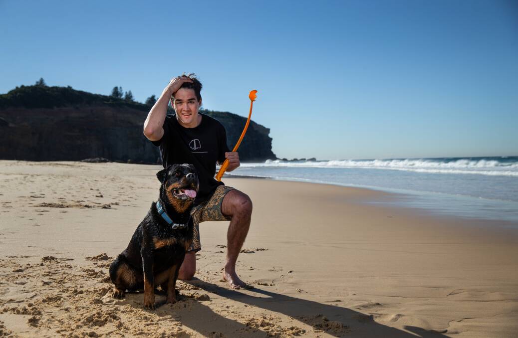 Road to recovery: Lawson Rankin is back home, back walking, and back planning to go to university after a scooter accident in Bali left him fighting for life. Pictured with his dog, Juka. Picture: Marina Neil
