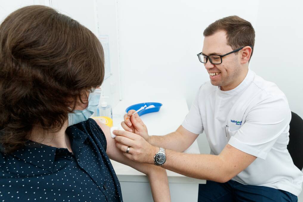 Free jabs: Brady Haskell, of healthSAVE Chemist at Charlestown, said they were prepared for the winter flu season ahead of the NSW government's month long flu vaccine blitz. Picture: Max Mason-Hubers