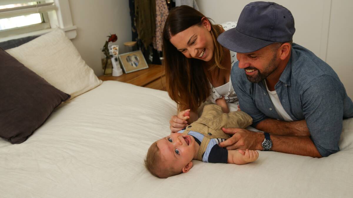 Rachel, Jay and baby son Harrison Peake are participating in a Type 1 diabetes trial.