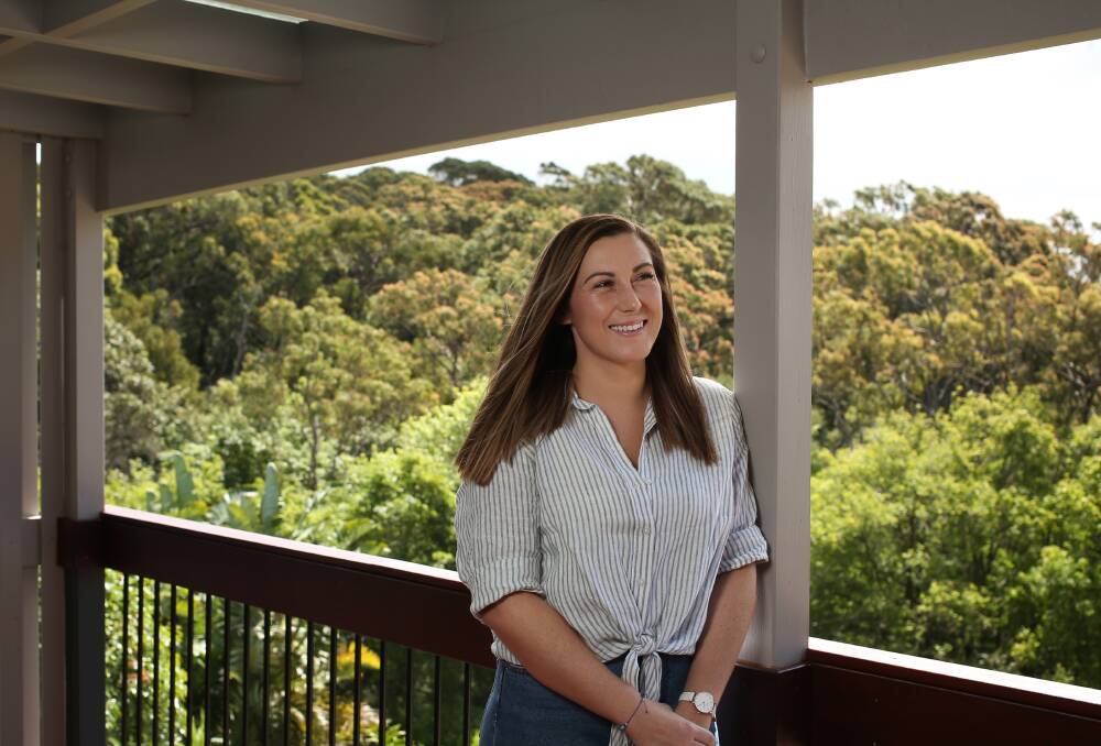 Homecoming: Tiarne Gillespie is elated to be back home in Newcastle. Passenger caps on international flights to Australia have left thousands of people like her scrambling to return home. Picture: Simone De Peak