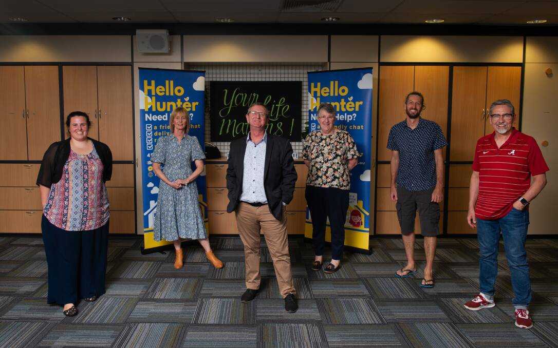 Call me: Rick Prosser, centre, and other Hunter church leaders have started a new charity called Hello Hunter. PICTURED: L-R Jessie Barker - Hello Hunter Call Centre Team, Roz Zaia - Macquarie Life Church Pastor, Rick Prosser - Hello Hunter and Cityserve Chairman, Teresa Brierley - Catholic Diocese Maitland - Newcastle , Director Pastoral Ministries, Matthew Brown - Regional Minister Hunter Baptist Churches and Keith Edwards - C3 Regional Director. Picture: Marina Neil 